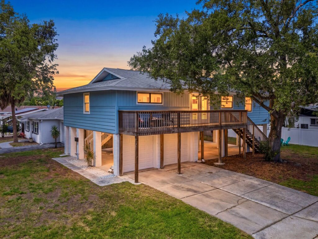 Elevated stilt home with balcony Shore Acres